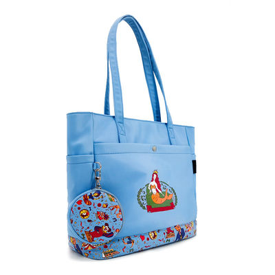 Un sac à main en toile, un sac à fente, un sac à imprimer en numérique, un sac bleu avec une poche à pièces.