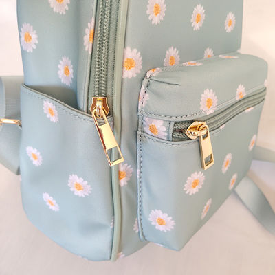 Petit sac à dos bleu à la mode avec fermeture à glissière
