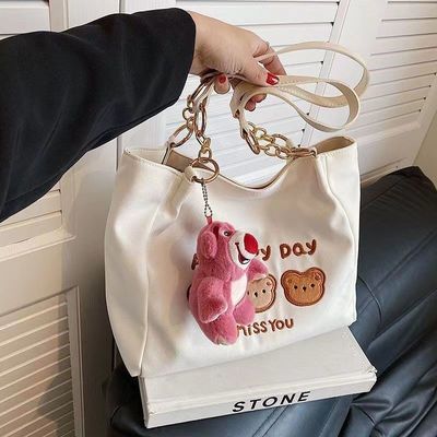 Sac à dos à corps croisé de taille moyenne et élégant de couleur brune avec poignées doubles