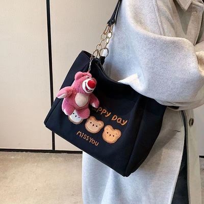 Sac à main blanc et noir avec ceinture réglable