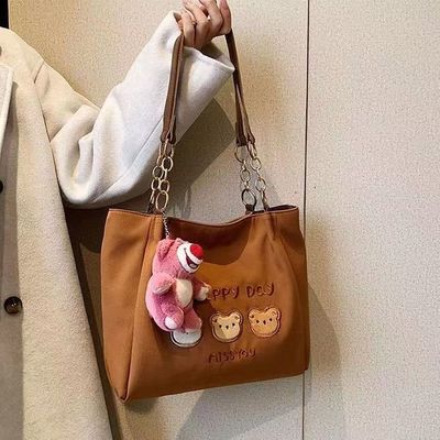 Sac à main blanc et noir avec ceinture réglable